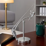 balanced fisherman sculpture